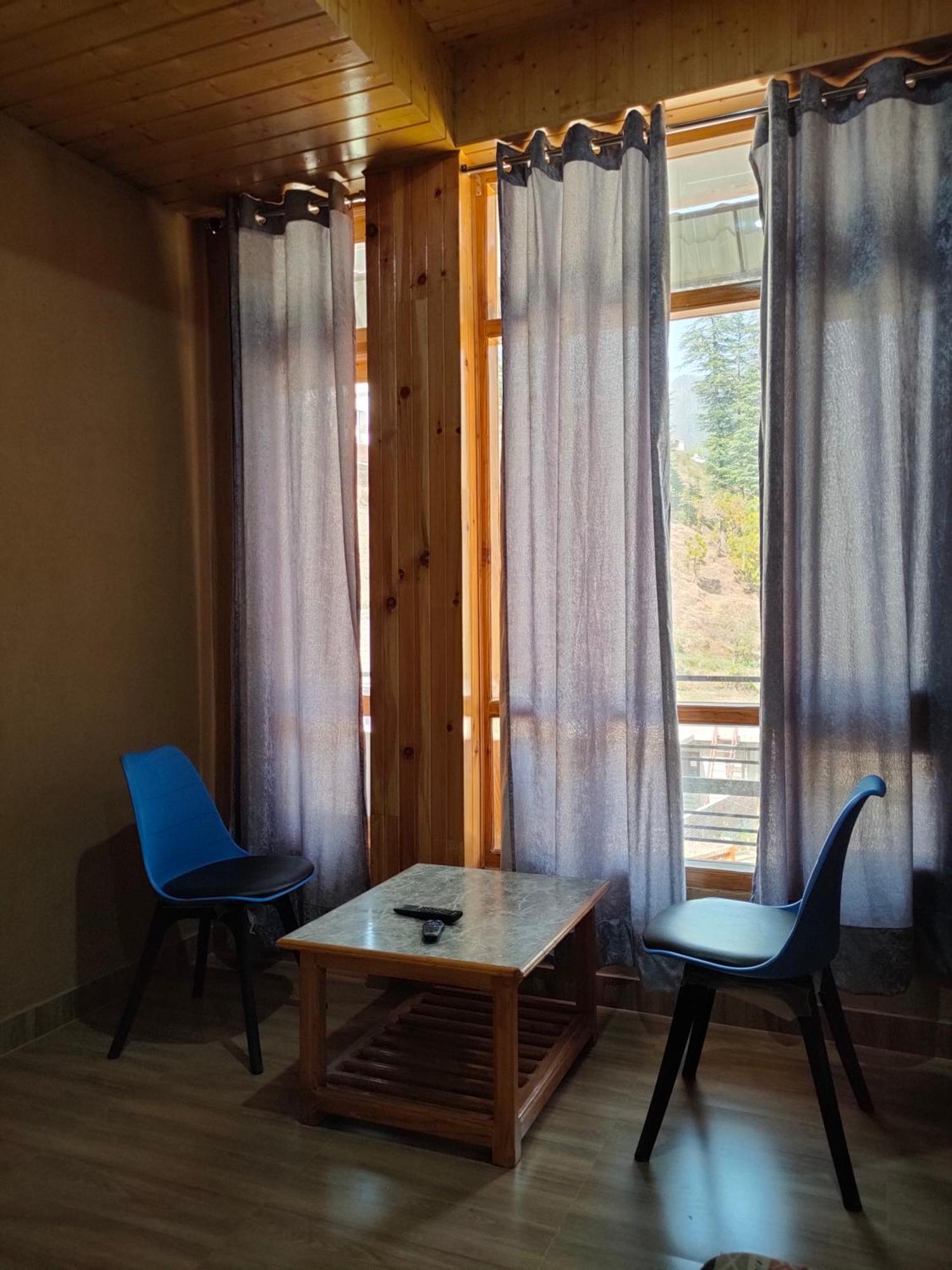 Hotel Cozy Haven Mandi Szoba fotó